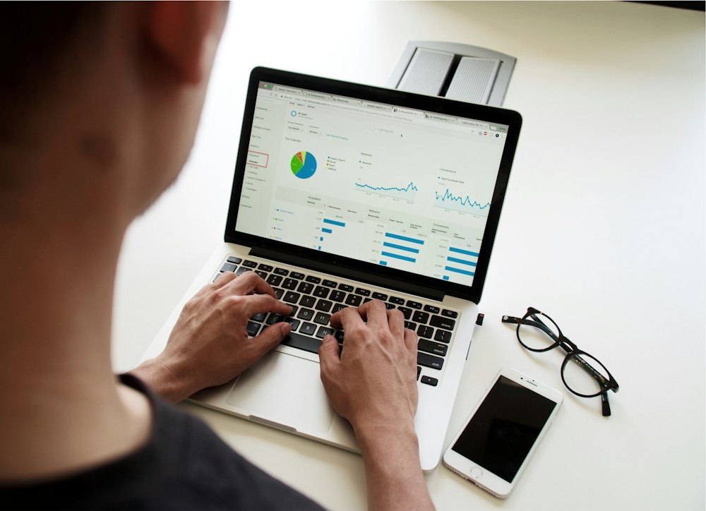 Laptop showing a performance dashboard used for workflow automation reporting